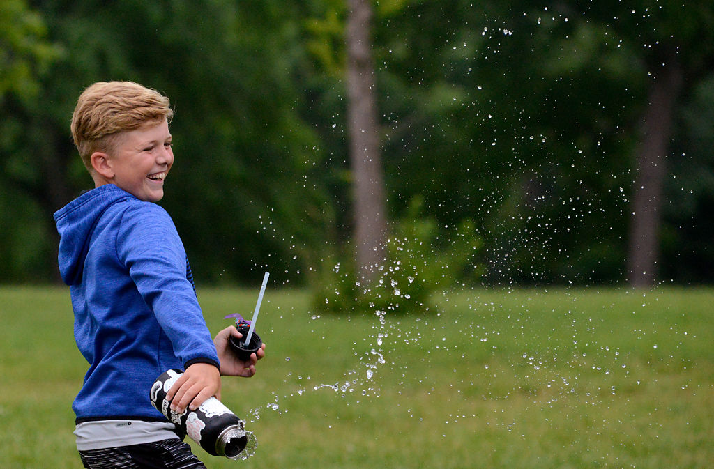Ben Hansman, 11, retaliates in a water fight